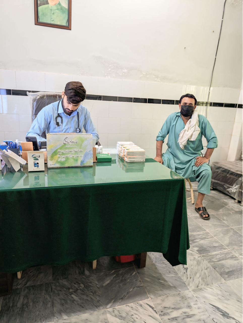 Dr. Mujeeb during a patient consultation